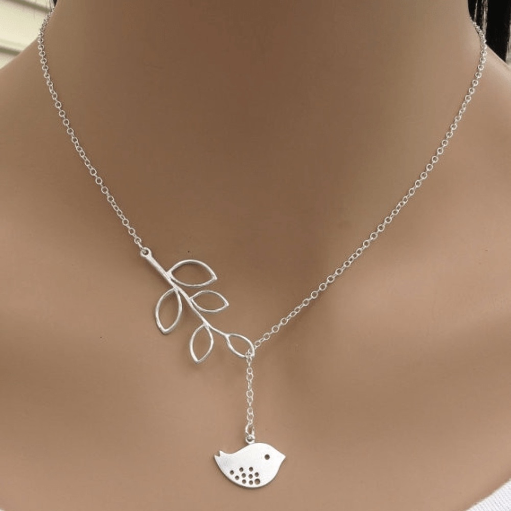 Hollywood Sensation silver dove necklace